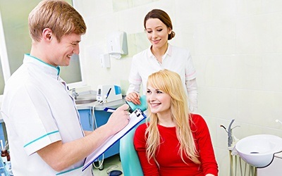 dentist speaking to patient