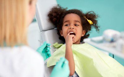 Girl receiving care from a children’s dentist in McKinney