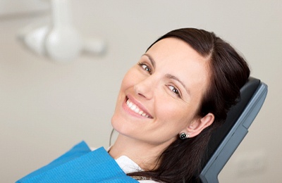 Smiling woman in the dental chair 