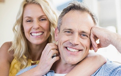 Smiling couple with healthy teeth