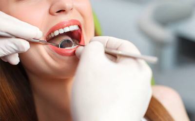 Woman having dental exam