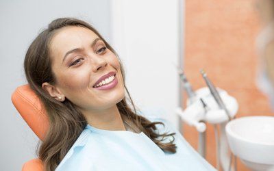 Woman smiling in dental chair