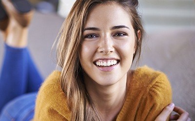 Young girl with flawless straight teeth