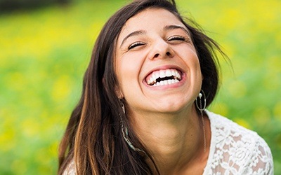 Laughing woman outside