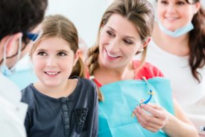 mom and daughter at dentist